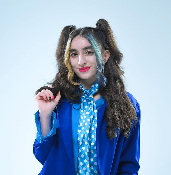 Yamuna Hasan in a blue suit